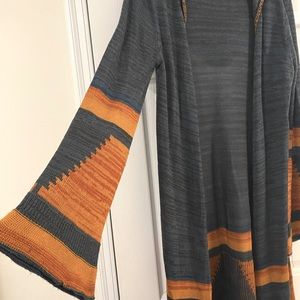 Size M navy and orange cardigan from Altar’d State. Long, hood, bell sleeves